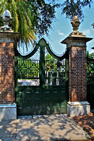 Green Gate with Brick Pillars